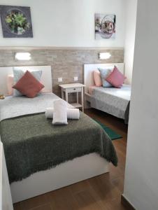 Posteľ alebo postele v izbe v ubytovaní TARA I APARTAMENT