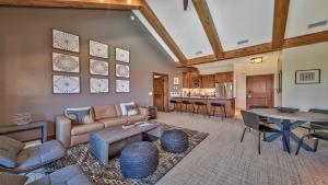 a living room with a couch and a table at Luxury Residence - Gondola Across The Street Condo in South Lake Tahoe