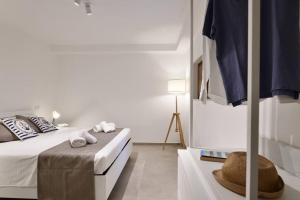 Postel nebo postele na pokoji v ubytování Cosy and Modern Apartment Portu Frailis