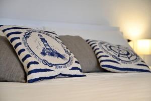 Postel nebo postele na pokoji v ubytování Cosy and Modern Apartment Portu Frailis