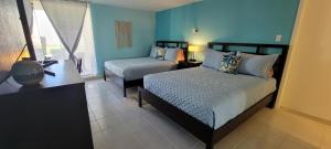 Llit o llits en una habitació de Bahia Mar #426