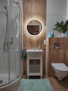 Kúpeľňa v ubytovaní Apartament Jagiełły 14