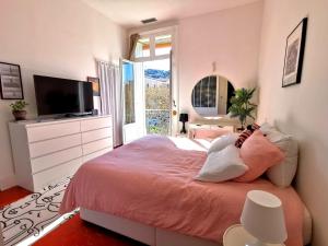 Ένα ή περισσότερα κρεβάτια σε δωμάτιο στο Deux Pièces Luxe - Le Casanova