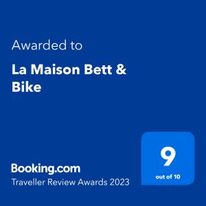 Sertifikāts, apbalvojums, norāde vai cits dokuments, kas ir izstādīts apskatei naktsmītnē La Maison Bett & Bike