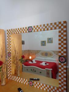 A bed or beds in a room at Mary Home - Casa Vacanza Taormina