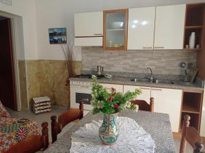 A kitchen or kitchenette at Mary Home - Casa Vacanza Taormina