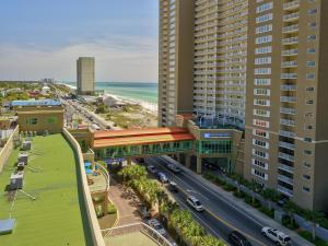 an aerial view of a city with tall buildings and a road at Emerald Beach #1331 by Nautical Properties Vacation Rentals in Panama City Beach