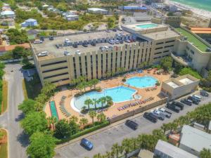 an overhead view of a hotel with a pool at Emerald Beach #1331 by Nautical Properties Vacation Rentals in Panama City Beach