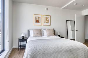 Voodi või voodid majutusasutuse South Lake Union 2br w gym roof nr downtown SEA-553 toas