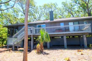 a large house with a large deck on a beach at 359 Tarpon Blvd in Fripp Island