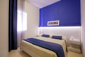 Voodi või voodid majutusasutuse Gattarella Family Resort Puglia - Standard Half-Board à buffet toas