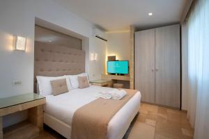 Voodi või voodid majutusasutuse Gattarella Family Resort Puglia - Standard Half-Board à buffet toas