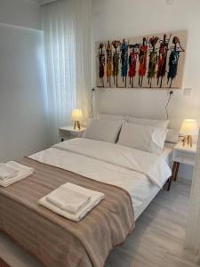 Postel nebo postele na pokoji v ubytování Cozy House At The Most Luxurious District
