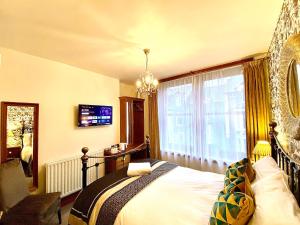 Μια τηλεόραση ή/και κέντρο ψυχαγωγίας στο Elm Tree Lodge