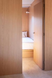 Wecamp San Sebastián客房内的一张或多张床位