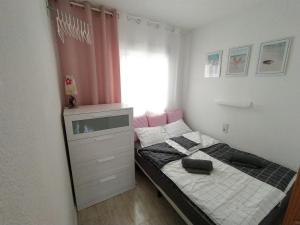 Postel nebo postele na pokoji v ubytování MILA Słoneczny Apartament w Torrevieja Centrum