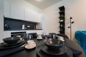 A kitchen or kitchenette at The View 1