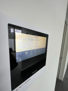 A television and/or entertainment centre at The View 1