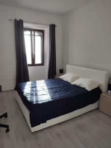 A bed or beds in a room at Casa Levante