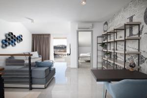 a living room with a couch and a table at Apartman Damjan in Pješčana Uvala