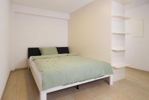Postel nebo postele na pokoji v ubytování Hotel Ochsen Rapperswil/BE