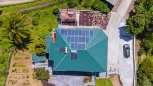 an overhead view of a house with solar panels on it at Belle Etoile in Soufrière