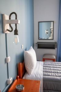 Voodi või voodid majutusasutuse Hotel Theoxenia toas