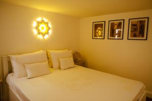 A bed or beds in a room at San Gaetano Luxury Home