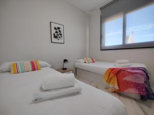 Postel nebo postele na pokoji v ubytování SUNSET DRIVE superb apartment