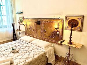 מיטה או מיטות בחדר ב-Il Vecchio Cortile