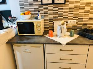 A cozinha ou cozinha compacta de Pé do Castelo Casinha - pet friendly & garage