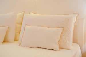 A bed or beds in a room at San Gaetano Luxury Home