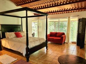 Postelja oz. postelje v sobi nastanitve OLP Treehouse Cerro Azul