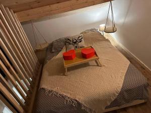 Ένα ή περισσότερα κρεβάτια σε δωμάτιο στο SPA esprit cabane perchée