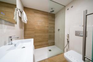 Koupelna v ubytování Hotel La Colina + 37 fotografií