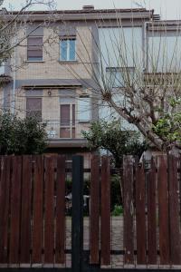a wooden fence in front of a house at La casa di Grazia in Rome