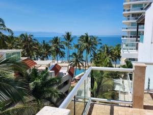 a view of the beach from the balcony at Lovely 4 bedroom penthouse Terra PH23 QueridaEstancia in Nuevo Vallarta