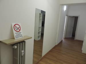 a room with a no smoking sign on a wall at Sciesa Guest House in Verona