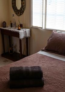 Una cama o camas en una habitación de LA CASA DE CLAU 7 fotos más