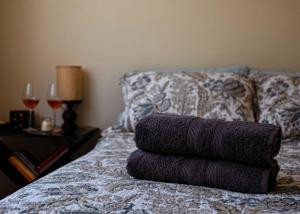 Una cama o camas en una habitación de LA CASA DE CLAU