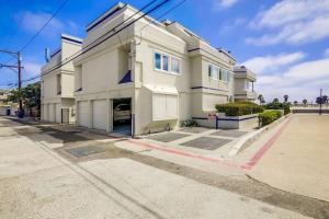 a large white building on a street at 125-fun In The Sun Penthouse in San Diego