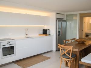 Dapur atau dapur kecil di Appartement Toucan - Grand standing pleine vue mer