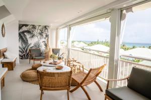 Area tempat duduk di Appartement Toucan - Grand standing pleine vue mer
