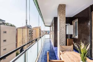 A balcony or terrace at Morgantini House San Siro-Duomo "Netflix & Terrace"