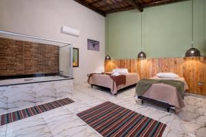 Ein Bett oder Betten in einem Zimmer der Unterkunft Pousada Pitauá