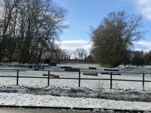 Holiday home on a riding stable v zimě