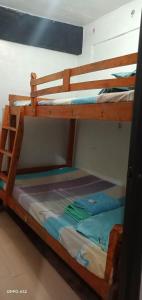 a pair of bunk beds in a room at Berly Homestay in Baguio