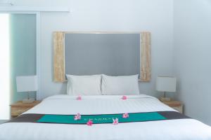 Voodi või voodid majutusasutuse Umadhatu Resort by Amerta toas