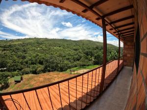 a view from the balcony of a building looking at a mountain at VILLA ISABELLA in Curití
