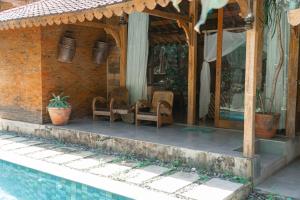 Bassein majutusasutuses Umadhatu Resort by Amerta või selle lähedal